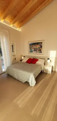 Letto o letti in una camera di Affittacamere L'Orto dei nonni