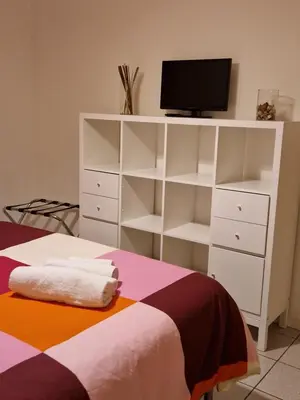 Letto o letti in una camera di Casa Bebe - adiacenze Policlinico e Universita'