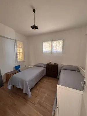 Letto o letti in una camera di M'illumino d'immenso - MONEGLIA APARTMENTS