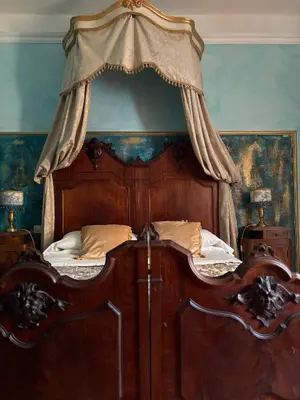 Letto o letti in una camera di Foresteria di Palazzo Picedi - Historic Rooms Sarzana
