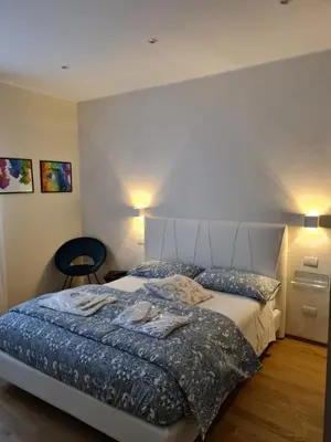 Letto o letti in una camera di RESIDENZA VENTURINI 2.0