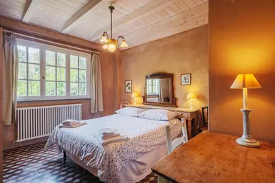 Letto o letti in una camera di Agriturismo di Charme e Ristorante Stallato Il Filo di Paglia