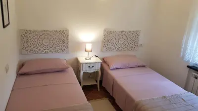 Letto o letti in una camera di Casa Michelle 