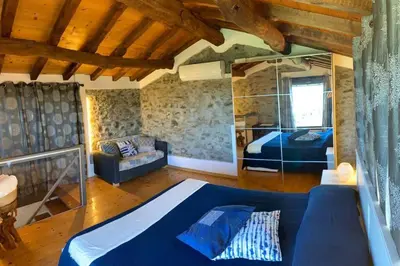 Letto o letti in una camera di La Rosa dei Venti a 2 km dal mare di Lavagna