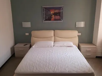 Letto o letti in una camera di La Casa del Pinguino - In the Center with AC