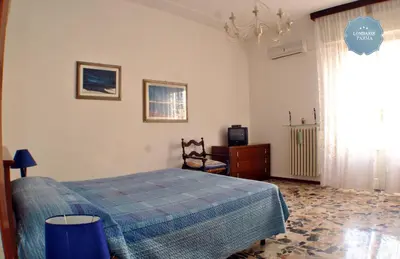 Letto o letti in una camera di Lombardi Rognoni