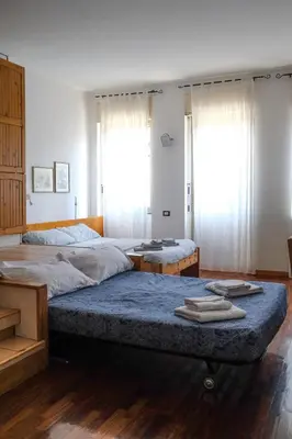 Letto o letti in una camera di Casa Giuly