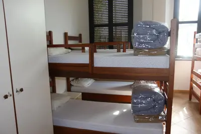 Letto o letti in una camera di Student's Hostel Parma