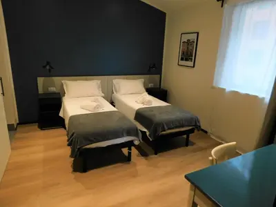 Letto o letti in una camera di Piumaviola Beds & Apartments