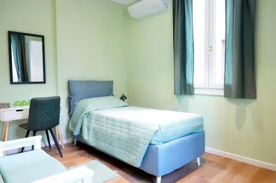 Letto o letti in una camera di Meuble' 21 di Anna