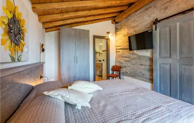 Letto o letti in una camera di Perla