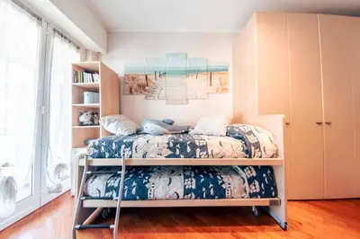 Letto o letti in una camera di Casa Luca Flexyrent - Parking - A C - WiFi