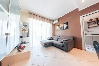 Area soggiorno di Casa Luca Flexyrent - Parking - A C - WiFi