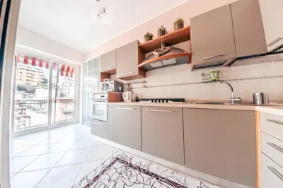 Cucina o angolo cottura di Casa Luca Flexyrent - Parking - A C - WiFi