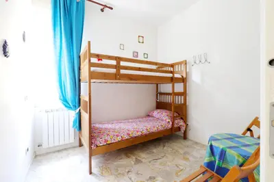 Letto o letti in una camera di La casa di Irene