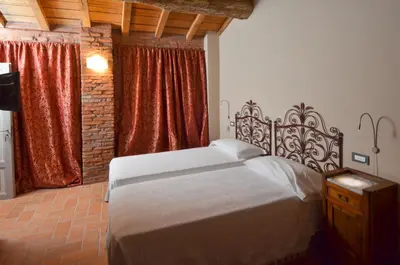 Letto o letti in una camera di Corte Motte