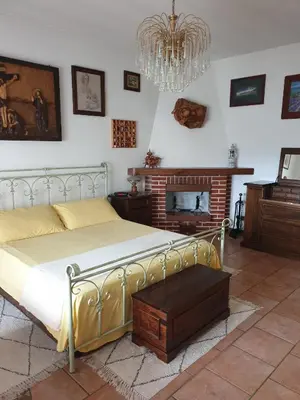 Letto o letti in una camera di Ca' Olivella