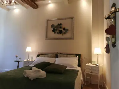 Letto o letti in una camera di AriediParma - Rooms&apartments