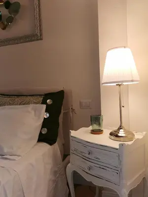 Letto o letti in una camera di AriediParma - Rooms&apartments