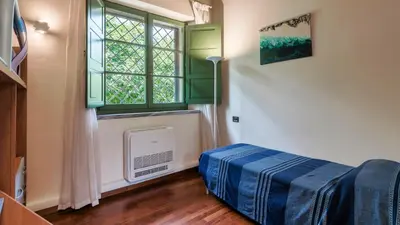 Letto o letti in una camera di Villa Elsa 6, Emma Villas