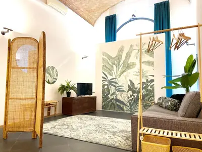 Area soggiorno di The Jungle Apartment