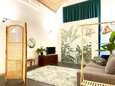 Area soggiorno di The Jungle Apartment