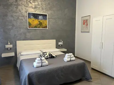Letto o letti in una camera di B&B La Villetta