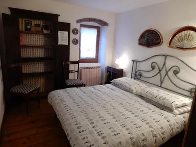 Letto o letti in una camera di Il Borgo della Colomba