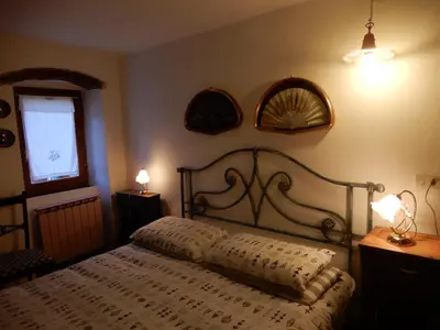 Letto o letti in una camera di Il Borgo della Colomba