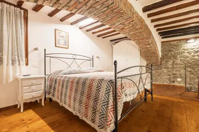 Letto o letti in una camera di 025- La casa di Esmeralda (011017-LT-0667)