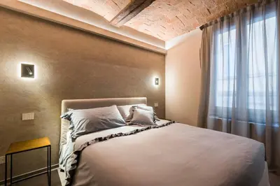 Letto o letti in una camera di Torre 13