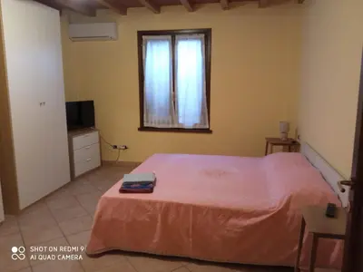 Letto o letti in una camera di B&B I GEMELLI