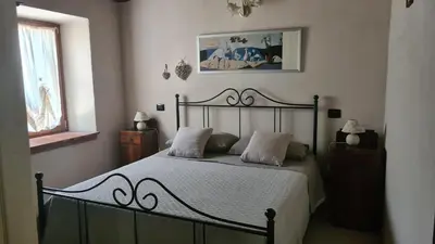 Letto o letti in una camera di Agriturismo Podere Borgo Malnido