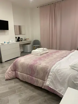 Letto o letti in una camera di Affittacamere La Riviera