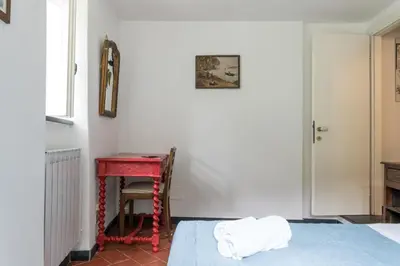 Letto o letti in una camera di Villa Smith