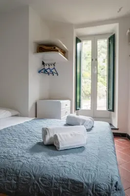 Letto o letti in una camera di Villa Smith