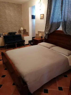 Letto o letti in una camera di Casa Mary