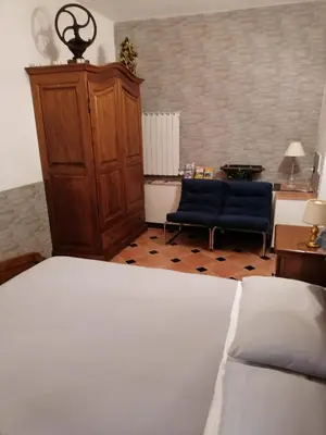 Letto o letti in una camera di Casa Mary