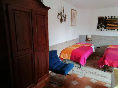 Letto o letti in una camera di Casa Mary