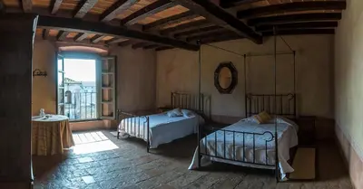 Letto o letti in una camera di Villa Bottini La Limonaia