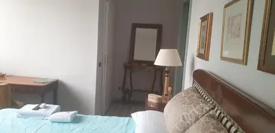 Letto o letti in una camera di GRAZZANO ANTICA STAZIONE