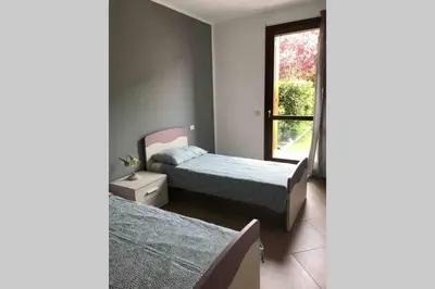 Letto o letti in una camera di La casa di Leo
