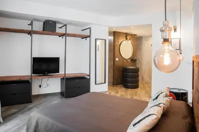 Letto o letti in una camera di Vespa Apartments
