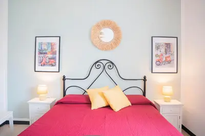 Letto o letti in una camera di Vespa Apartments