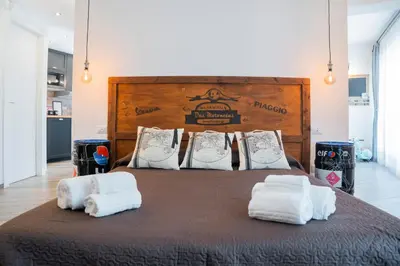 Letto o letti in una camera di Vespa Apartments
