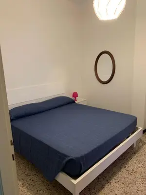 Letto o letti in una camera di Casa Bianca 6 - confortevole in centro a Moneglia