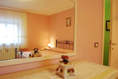 Letto o letti in una camera di B&B Da Franca
