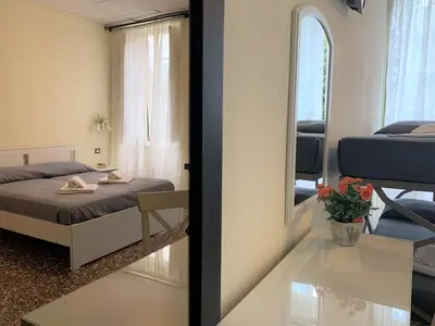 Letto o letti in una camera di Hotel Baia di Levanto