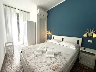 Letto o letti in una camera di Hotel Baia di Levanto