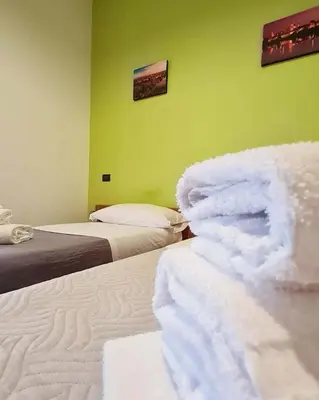 Letto o letti in una camera di 4 Venti